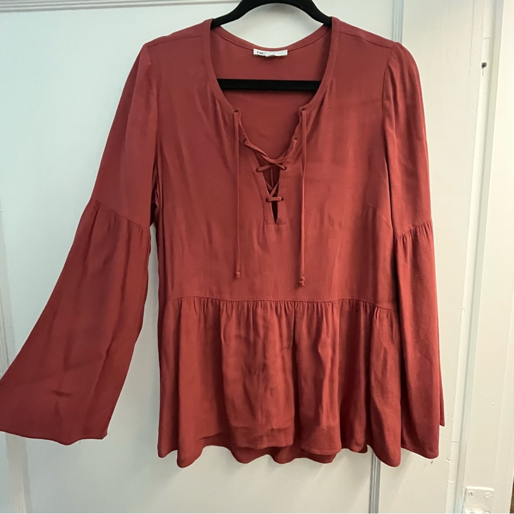 Long sleeve top with bell sleeves